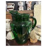 Green depression glass pitcher