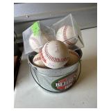Bucket of misc Baseballs