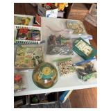 Tabletop of misc toys, books, collectibles