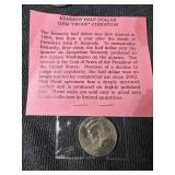 Gem condition, Uncirculated Kennedy half dollar