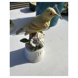 Yellow bird figurine