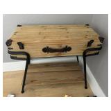 Luggage on a stand chest