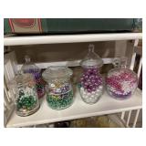 Misc cannisters with decorative items