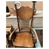 Pressed back wooden chair