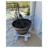 Plant, planter and wooden stand