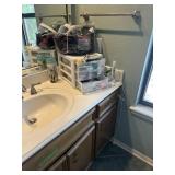 Misc contents of  2bathrooms and linen closet