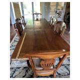 Beautiful wooden table and chairs, leaf included
