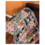 Handstitched Yo-Yo pattern lap throw