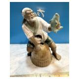 Asian Mud man figurine