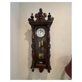 Antique wall hanging clock