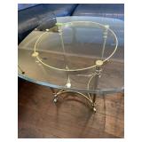 Glasstop brass leg table