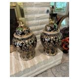 Large Pair of black and gold Urns w/lids