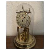 Anniversary clock-glass dome