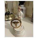 Nursing and caring figurine