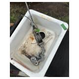 Castiron sink & come-a-long