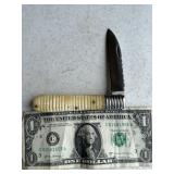 Unusual handle folding knife