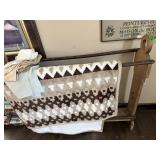 Wooden quilt rack w/blanket