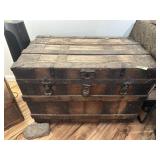 Antique wooden flat-top trunk