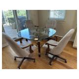 Glasstop table with 4 chairs