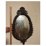 Oval decorative mirror