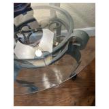 Glass top and iron legs table