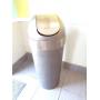 Metal wastebasket with fip top