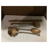 Cast-iron spoons and rack