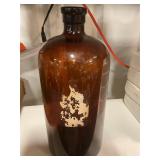 Brown glass  bottle, 13 inches tall