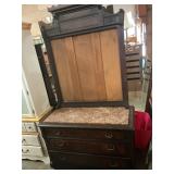 Marble top dresser, missing mirror has framed