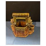 Vintage McCoy Wishingwell planter with chip