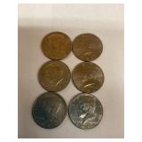 Six Kennedy half dollars