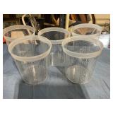 Five mixing paint cups