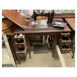 Antique Damascus grand sewing machine in cabinet