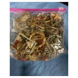 Bag of assorted costume jewelry