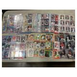 Baseball trading cards in album sleeves