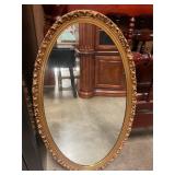 Oval wall mirror, 39 inches tall