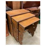 Set of wooden nesting tables