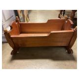 Wooden baby doll cradle