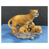 Ceramic lion with cubs statue