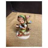 Hummel figurine titled " Spring Time"