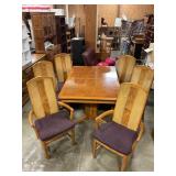 Table w/ 4 chairs, 2 chaplains chairs & 2 leaves
