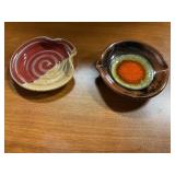 2 pottery plater 4"