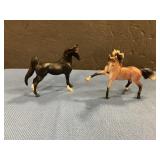 Two miniature Breyer horse
