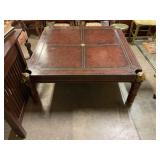 Leather wrapped table w bronze lion heads 44ï¿½x44ï¿½