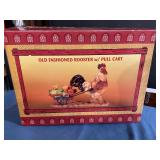 Old-fashioned rooster with pool cart in box