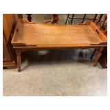 Wooden coffee table with glass insert