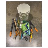 Yard tools in 5 gallon bucket
