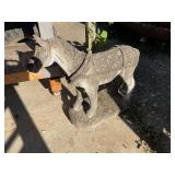 Concrete horse with crack