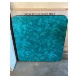 Green folding card table