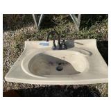 Sink with faucet